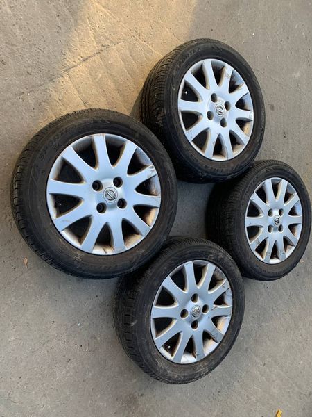 Комплект легкосплавних дисків 4/114,3 з гумою 205/55 R16 Nissan.,б.в. 980809 фото