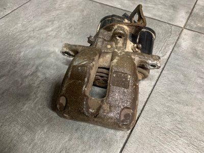 Супорт задній лівий Volkswagen Passat B6, 2005-2011 р., 2.0 TSFI, універсал, б.в. 0-=0=-0=-0 фото