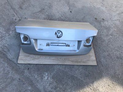 Крышка багажника Volkswagen Jetta 2007 г. седан, 1K5827025AE, б.у. 1K5827025AE фото