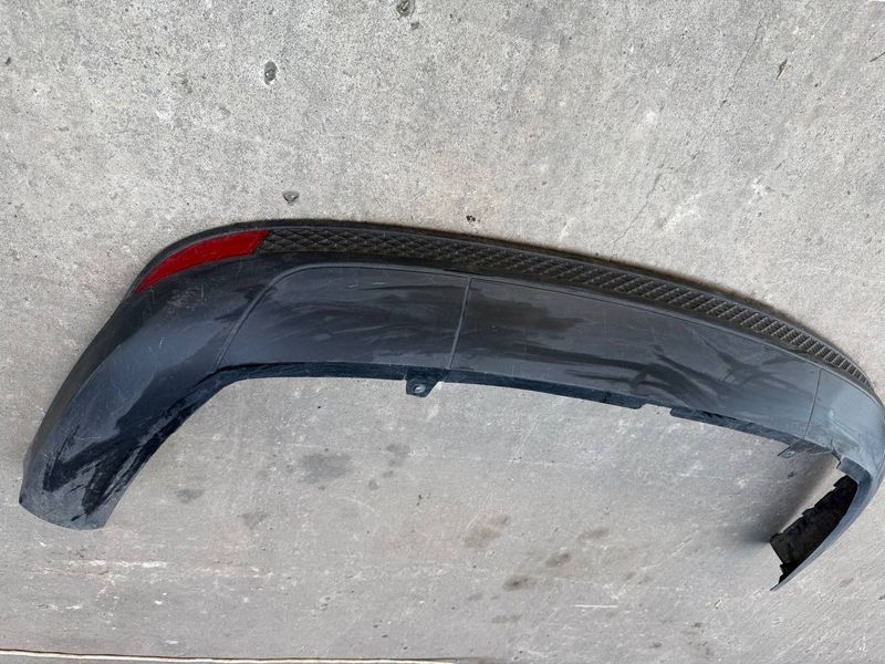 Нижня накладка, губа заднього бампера Ford Focus MK3, 2011-2014 р.,  седан, USA, BM5117A894, б.в. BM5117A894 фото
