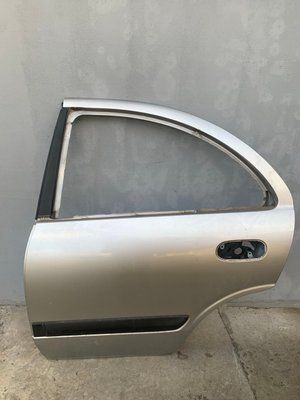 Дверь задняя левая Nissan Almera N16, 2005 г., 821019M730, б.у. 821019M730 фото