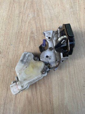 Замок задніх лівих дверей Nissan Almera Classic B10RX 2006-2012р, б.в. 7887031120 7887031120 фото